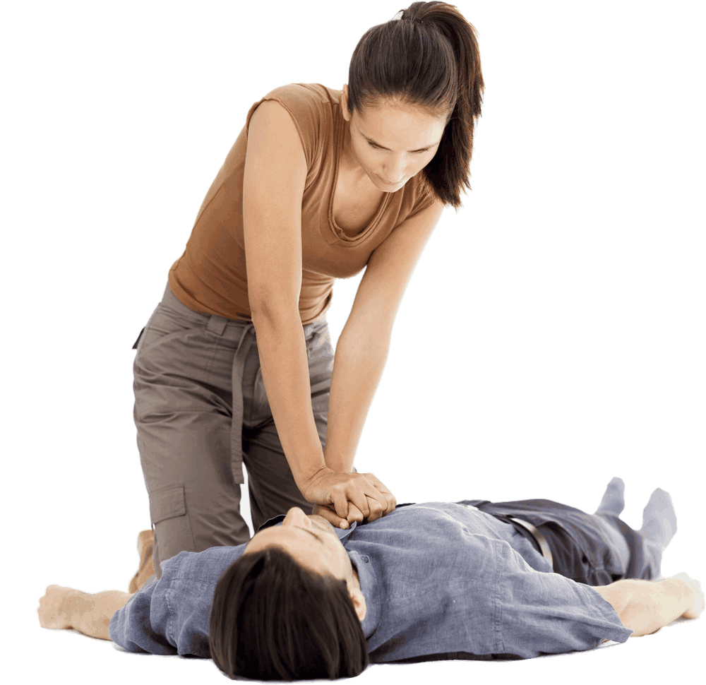 A woman performing chest compressions on a man lying on his back, hands interlaced on the centre of his chest